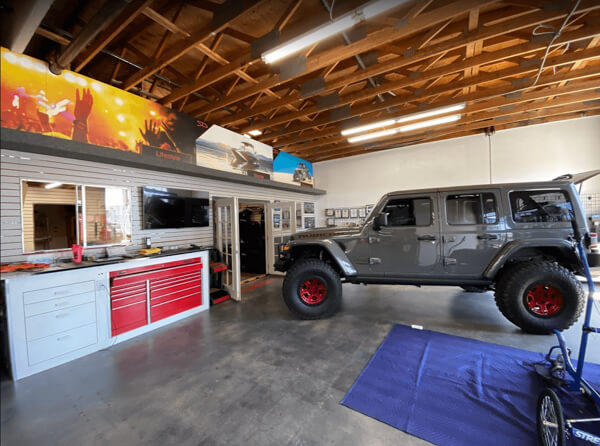 about Soundelux shop interior with jeep wrangler