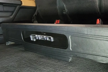 Custom under-seat subwoofer enclosure for Ford F-150 installed by SounDelux in San Diego for premium truck audio and clean bass performance.