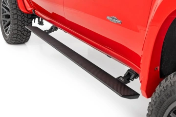 Electric powersteps installed by SounDelux in San Diego for easier access to lifted trucks.